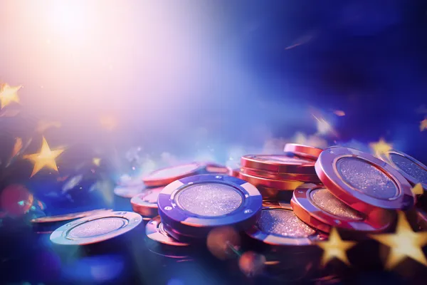 A glamorous woman holding casino chips in a neon-lit environment, representing the premium online casino atmosphere of DEWA700.
